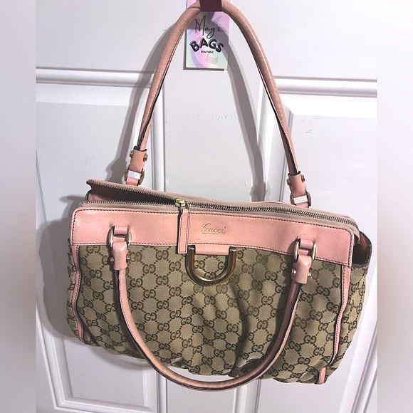 Gucci: Abbey D-Ring Gold GG Canvas Shoulder Bag (baby pink)